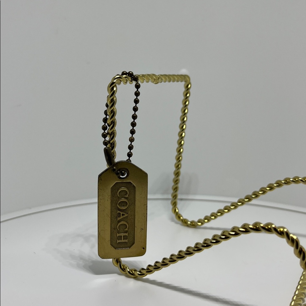 vintage Coach gold-tone brass hangtag keychain or bag charm